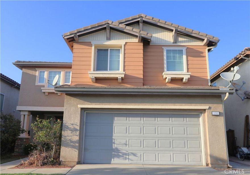 Welcome to this magnificent 5 bedroom, 3 full baths, 2614 sq. ft. home in the gated community of The Groves! This is the largest model in the community and is very well kept. It features newer floors and air condition unit. As you enter through the front door, you will be wowed by the soaring high ceilings and spacious formal room. The family room has a cozy fireplace and leads to the charming open concept kitchen. The kitchen has corian counter-tops, a large island that can be a breakfast bar, decorative glass cabinets, stainless steel sink and a great deal of counter space and cabinets for storage. Walk thru the sliding glass door to the low maintenance back yard that is entirely concrete and has several fruit trees you will enjoy. The main level has a bedroom with closet, full guest bath with standing shower, ample closet space next to the entrance and under the stairs. A downstairs hallway takes you to the attached spacious 2 car garage. Upstairs you will find 3 more sizable bedrooms and the primary bedroom with ensuite primary bath. You will find at the upstairs hallway a full bath with double sinks and a shower/bath tub combo and the laundry room with plenty of cabinets and a utility sink. You will appreciate the community playground, swimming spool and spa and quiet walkways. Located minutes from the 10 fwy, Western College, Pomona College, Claremont Colleges and the University of La Verne. Come see this beautiful home that is perfect for a large family.