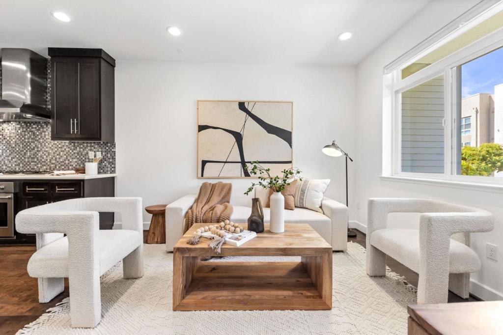 Conveniently a block away from the community garden and Paddock Park, this townhome features 4 spacious bedrooms and 4 baths. Versatile main floor with living, dining, and kitchen naturally flowing from one room to the next. The kitchen is equipped with quartz counters, a large island, custom tile backsplash over a gas range. Off the dining space, a sliding glass door leads to a balcony, great for outdoor grilling. There is a bedroom and full bathroom off the main living area. Upstairs, retreat into a luxurious king suite with an XL walk-in closet, double vanities, and an oversized shower with rain bath system. Sliding glass doors ushers in natural light and fresh air from another private balcony. There is a smaller 2nd suite with a generous built-in closet and shower over the tub. A fourth suite is conveniently located downstairs for additional privacy and is perfect for an entertainment room or guest retreat with storage. The entire home is equipped with smart home recessed lights and ethernet wiring. Side-by-side 2-car garage pre-wired for electrical vehicles. $458/month HOA due covers the exterior and water. Coveted Bay Meadow location is a short walk to Hillsdale Mall, Caltrain bullet, parks, Nueva School, Whole Foods, Blue Bottle, Fieldworks and more.