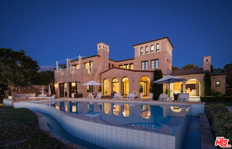 Indulge in the epitome of coastal opulence within this bespoke Newport Coast estate, nestled in the prestigious enclave of guard-gated Crystal Cove. Situated on one of the most sought-after streets within the community, this spectacular property embodies quintessential coastal living, boasting unparalleled luxury and breathtaking views. Perched behind the second set of gates at Crystal Cove, this sanctuary-like home offers unrivaled privacy and panoramic views of the ocean as far as the eye can see. This meticulously crafted residence encompasses an expansive living space, featuring 7 bedrooms, including 2 primary suites, and 9 bathrooms. The attention to detail is evident throughout, from hand-carved limestone fireplaces and mantels to the exquisite Venetian plaster that graces the interior. The home also includes a wine cellar, home theater, office, custom closets, a glam room, and four fireplaces strategically placed to create an ambiance of warmth and sophistication. Step outside to the ocean-facing backyard and be immersed in the endless beauty of the Pacific Ocean, with Catalina Island resting on the horizon. The outdoor amenities are as impressive as the interior, with a custom-tiled saline pool, BBQ pavilion, and outdoor bar surrounded by well-appointed hardscapes and landscapes. A sizable sunken fire pit with benches on all sides provides a perfect spot to gather and enjoy the coastal evenings and sunsets. Residents of Crystal Cove have access to exclusive amenities, including 24/7 guard-gated and patrolled security, tennis courts, pool and cabanas, a fitness center, numerous parks, pristine hiking trails, and proximity to the upscale Crystal Cove Promenade and the pristine Crystal Cove State Beach. Immerse yourself in a lifestyle of luxury at this exceptional Newport Coast residence.