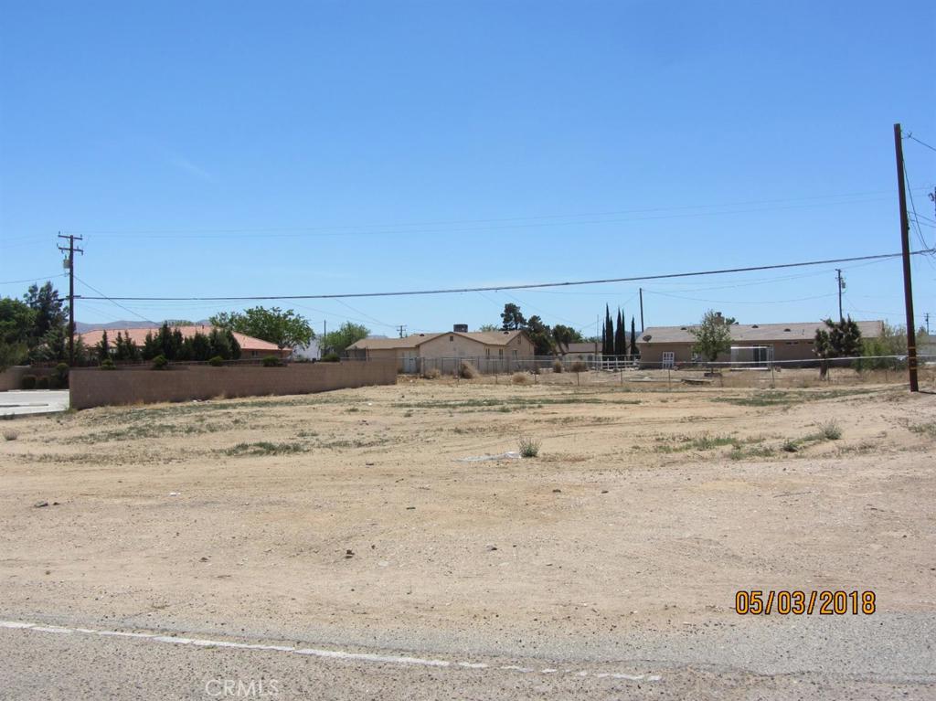 OWNER WILL CARRY! Bear Valley Road frontage. Great location right across from Victor Valley College! Zoned as C2. Property is located between Peach and Jacaranda next to existing dental office.