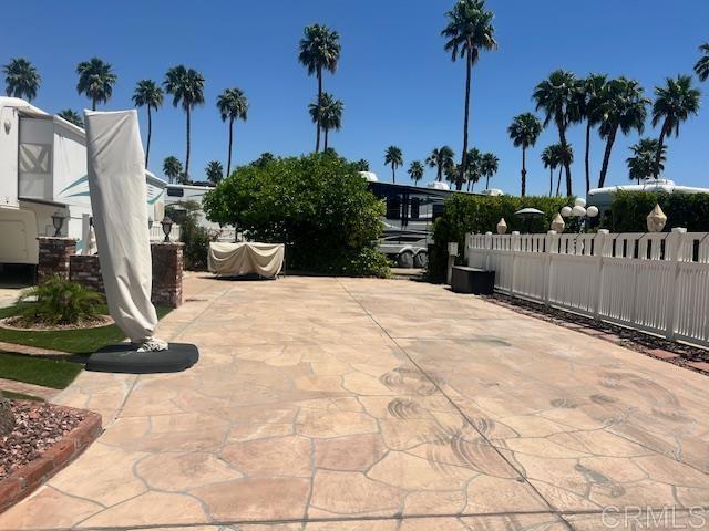 Lot 691 is oriented east to west with wonderful Mountain Views. Mid resort and a quick few minutes to the El Saguaro clubhouse, this stamped concrete widened space is ready for you to pull up, back in and immerse yourself into all the amenities ORPS has to offer. Outdoor Resort Palm Springs (ORPS) is a Guard Gated 5-Star RV Resort Community offering an active and luxurious lifestyle featuring golf (27 holes), tennis, pickleball, swimming and more! Two clubhouses, fitness center, beauty solan, La Roma Restaurant on campus, dog park and more!