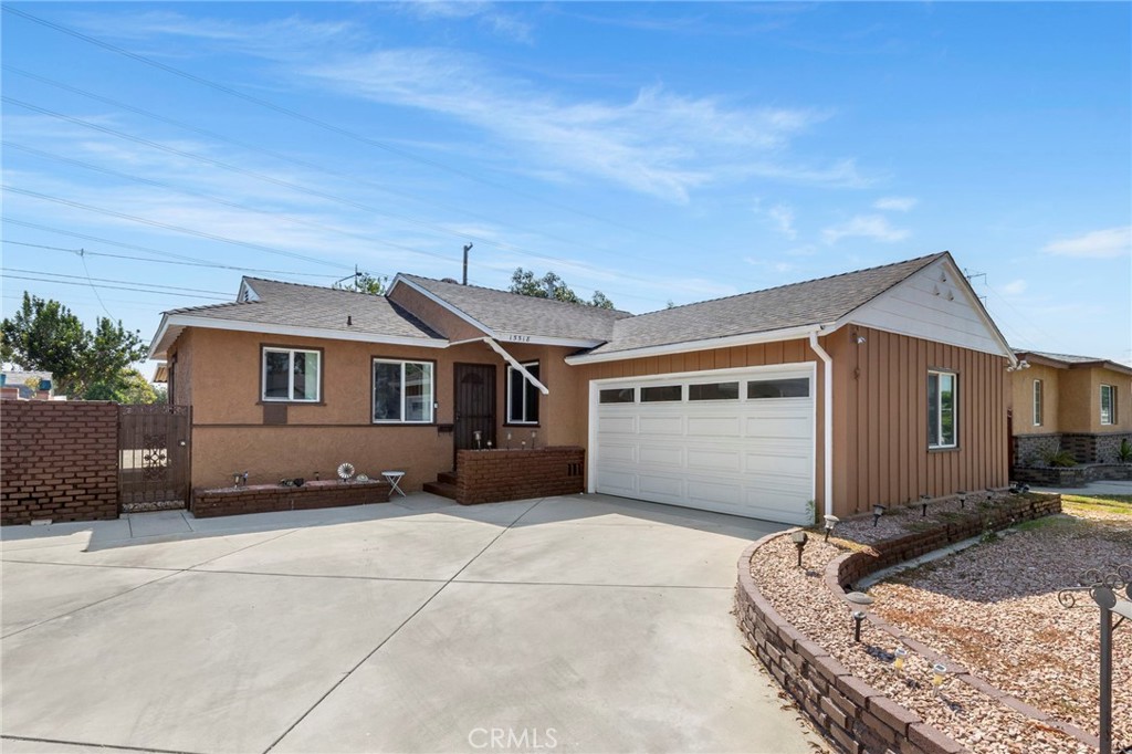 Pool home in fabulous Bellflower neighborhood!! Dive into comfort and charm with this inviting 3-bedroom, 2-bathroom pool home that blends classic character with modern touches. Enter through the formal entry area into a spacious living room featuring rich hardwood floors, a cozy wood-burning fireplace, and a large picture window that floods the space with natural light. The layout includes both a formal dining room and a casual breakfast nook, perfect for any occasion. The kitchen is bright and functional with white cabinetry, beige quartz countertops, glass-front upper cabinets, and oversized windows that offer lovely views of the neighborhood. Convenient indoor laundry is located just off the kitchen. All three bedrooms feature hardwood flooring, and the main bathroom has been thoughtfully updated with a remodeled stall shower and vinyl plank flooring, while the second bathroom serves as a powder room. Enjoy year-round indoor/outdoor living with an enclosed patio and a built-in rectangular pool out back — perfect for entertaining or just cooling off on sunny days. Energy-efficient newer windows throughout complete the package. An added bonus is the greenbelt just behind the property, providing additional privacy to your outdoor entertaining. This is the Bellflower pool home you’ve been waiting for — don’t miss it!