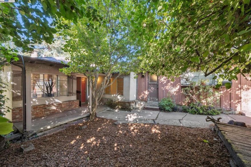 A classic Mid-Century home is waiting for you to bring it back to life. This substantial 5BD/2.5BA home is a contractor's special, offering a strong architectural canvas in highly-coveted North Berkeley's Cragmont neighborhood. The main level of the 1858 SQFT home  is filled with light and enjoys a dramatic vaulted and beamed ceiling and a brick fireplace in the spacious living area. The flexible layout includes level-in 3 bedrooms and 2 bathrooms upstairs, and a significant lower level with 2 bedrooms, a half bathroom, and a separate exterior-entry bonus room. This lower level provides endless possibilities for expansion into an apartment, studio, or guest quarters (buyer to verify). With a detached garage and a large lot ready for renovation, this is an unparalleled opportunity to build equity and a custom lifestyle. Located in a walker's paradise, it's a 6-minute walk to Codornices Park and the Rose Garden, and an easy 10 minute bus ride to the UC Berkeley campus and Downtown BART. Enjoy world-class dining, boutique shops along Solano Avenue and Shattuck Avenue moments away.