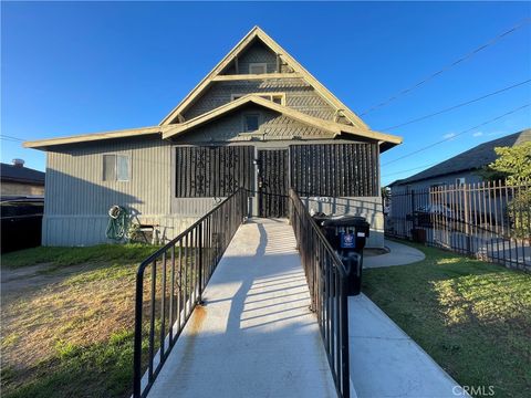 Photo of 1419 E 61st Street E, Los Angeles, CA 90001 (MLS # PW25247765)