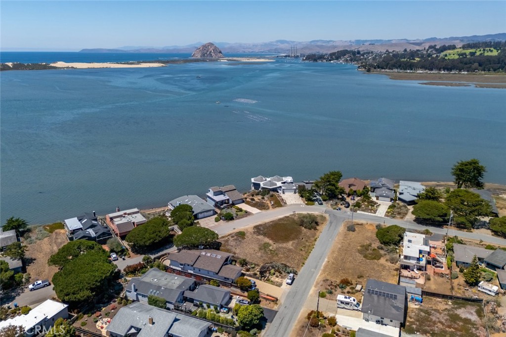 Incredible opportunity to build your dream home on this 5,531 sq ft corner lot located in the highly desirable Baywood Park neighborhood of Los Osos. Enjoy beautiful bay views and direct access to the water just across the street. This prime location offers the perfect blend of coastal living and natural beauty. Buyer to verify all building requirements with the County of San Luis Obispo.