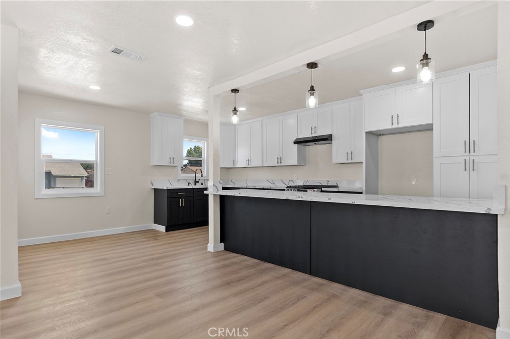 This beautifully redesigned open-concept home features 3 bedrooms and 2 bathrooms with a fully remodeled floor plan. Enjoy a seamless flow from room to room, with easy access to the expansive outdoor space. The detached garage offers ADU potential, while the generous backyard sets the stage for an entertainer’s paradise. This home is perfect for a family looking to set roots in LA County!