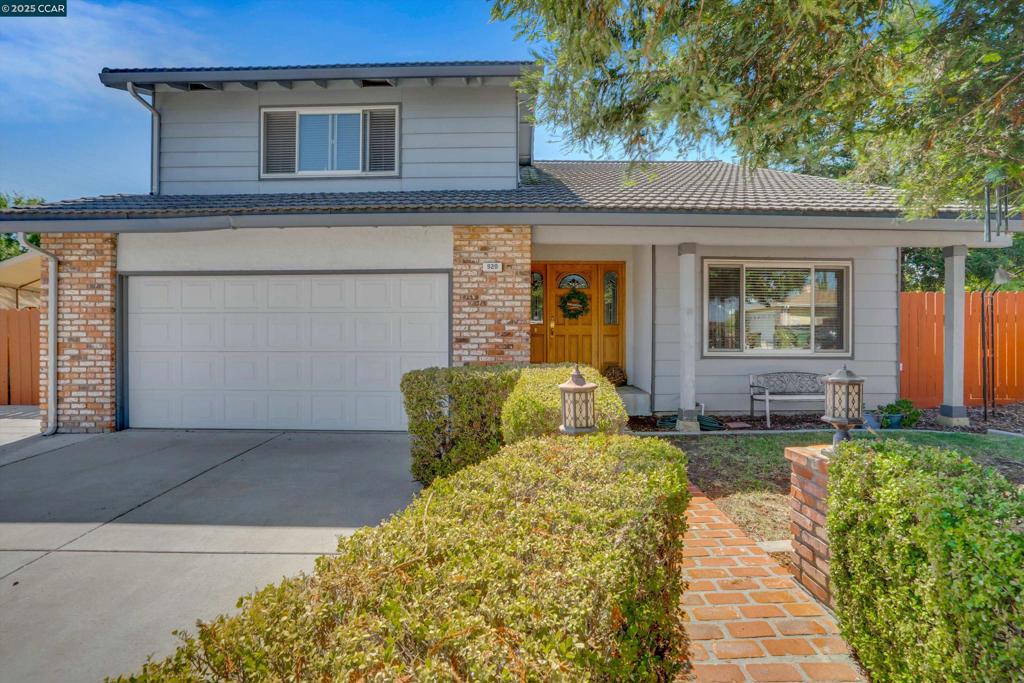Endless possibilities with this spacious 2,236 sq. ft., 5 bed/3 bath two-story home located at the end of the cul-de-sac! Step inside to discover beautiful hardwood floors downstairs, a large living room and family room with cozy fireplace insert and an open eat-in kitchen complete with dual zone HVAC. Downstairs bedroom has additional Private Entry offering in-law or ADU potential. Upstairs, the primary suite boasts an en suite bath and walk-in closet. Outside, enjoy Trex decking, soaring redwoods, and No Rear Neighbors. Ample side yard access for RV/boat storage, a large workshop with electricity, a greenhouse, and multiple garden beds. Located near freeway, shopping, parks, and trails. A must-see!