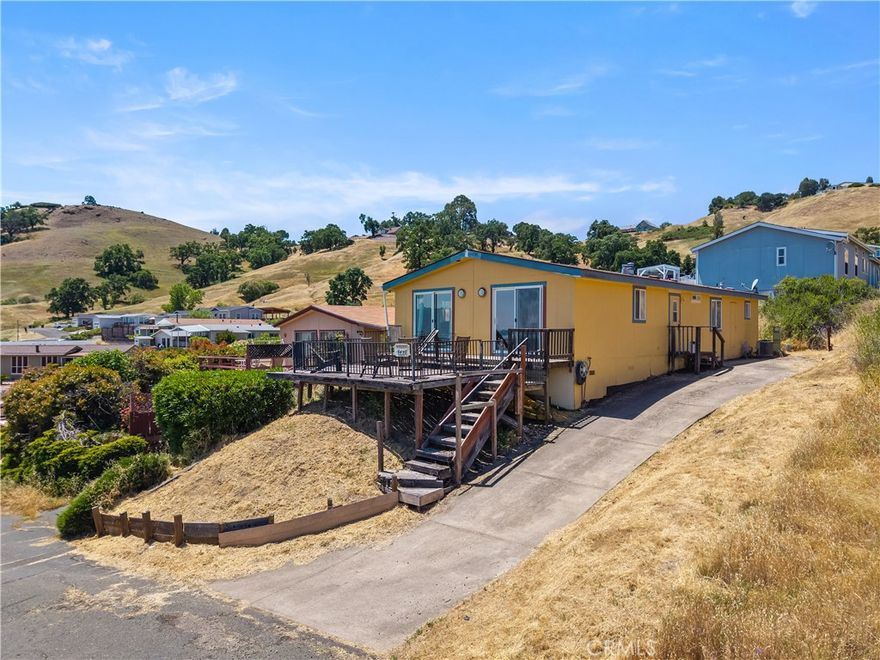 Terrific Lake Views in North Lakeport. Enjoy the quiet neighborhood with access to the lake at the Walnut Beach Association. Sunny open living room and kitchen with breakfast bar, lake views and access to deck. Primary bedroom with private bath, double closets and extra storage space. Formal dining room, central heat and air, and inside laundry room. Great location close to the lake, shopping and restaurants.
