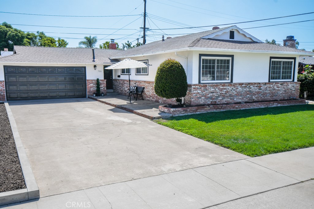 WOW! Welcome to this charming single-story home located in the highly sought-after Presidential Streets of Orange. This 4-bedroom, 2-bathroom property offers 1,537 square feet of living space on a 6,120 square foot lot, complete with a two-car attached garage and a beautifully maintained private backyard with brand new lawn.
Step inside to a bright and functional layout featuring fresh interior paint, refinished hardwood floors, and brand new carpet in the living room. The spacious family room includes a cozy white brick fireplace and large sliding doors that open to the backyard. The kitchen is clean and inviting with granite countertops, rich wood cabinetry, a garden window, and plenty of cabinet space. Both bathrooms are updated with timeless finishes and thoughtful details.
Set in one of Orange’s most beloved neighborhoods, this home is just minutes from the iconic Orange Circle, known for its antique shops, local cafes, and popular restaurants like Haven Craft Kitchen, Citrus City Grille, and The Filling Station. Nearby Chapman University brings a vibrant collegiate energy, while Villa Park Town Center, Santiago Creek Trail, and several local parks provide plenty of recreational options. Whether you’re commuting to Disneyland, enjoying a beach day in Newport, or heading to downtown LA, the central location with easy freeway access puts everything within reach. The home is also zoned for highly regarded Orange Unified School District schools, making it ideal for families.
With great charm and an unbeatable location, this is a wonderful opportunity to put down roots in the heart of Orange.