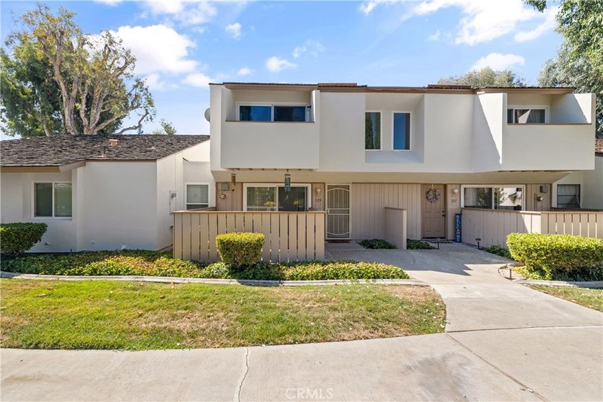 Welcome to this highly sought after country Road community! This two story townhome has 3 bedroom 1.5 bath with great views from front patio overlooking garden walkway. This community has multiple swimming pools, great clubhouse, Brea Mall minutes away, a wide variety of dinning close, excellent parks, entertainment. Brea has it all! This gorgeous townhome has laminate flooring as you enter a huge family room with recessed lighting and freshly painted.  Large storage area under stairs.  Remodeled 1/2 bath on first floor. Double pain windows, and sliders. 

Great size kitchen with gorgeous granite counters!  Off the kitchen has enclosed laundry room and shelving. Spacious bedrooms. Full bath upstairs newly renovated.  Primary suite is gigantic with office space built in, cozy balcony, large closet.  This home has a fantastic backyard, great space to entertain. Attached two car garage! All of this, plus the wonderful amenities Brea has to offer-top rated school, shopping, and dinning-are just a short walk from your doorstep.