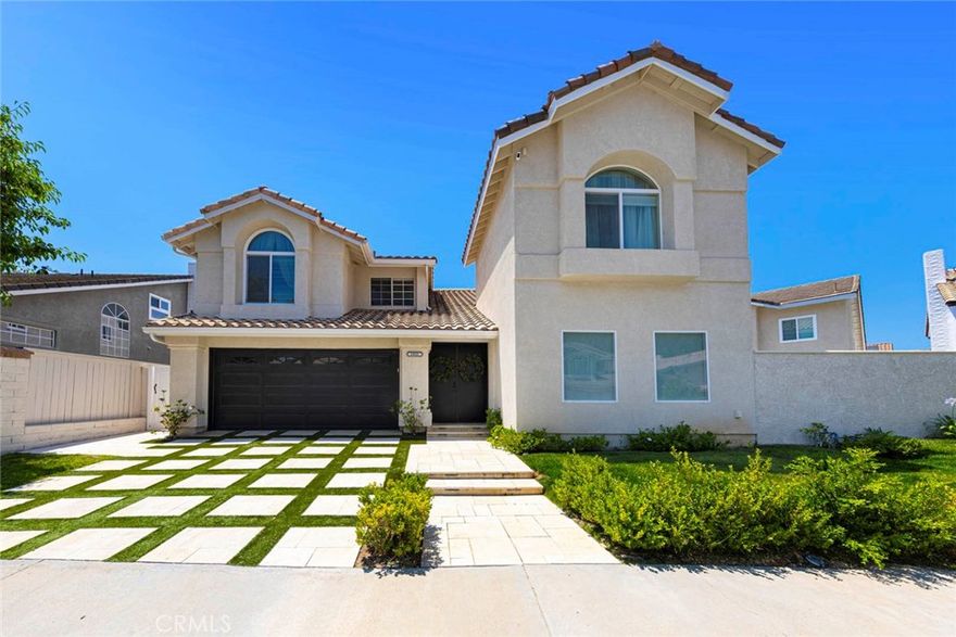 Situated in the highly sought-after Santiago Hills community, this elegant *Hunters Glen* residence by William Lyon Homes embodies refined living and timeless design. Positioned on one of the larger interior lots in the neighborhood, 8008 E. Fox Run Lane offers an exceptional blend of comfort, sophistication, and modern upgrades in a peaceful, private setting.Step through the front door and you’re immediately greeted by soaring ceilings, abundant natural light, and an open, airy floor plan designed for today’s lifestyle. The formal living and dining areas flow seamlessly together, creating an inviting space for entertaining or relaxing evenings at home. The beautifully appointed kitchen features generous counter space, sleek stainless-steel appliances, ample cabinetry, and a charming breakfast nook overlooking the backyard.Upstairs, the spacious primary suite provides a tranquil retreat with vaulted ceilings, a large walk-in closet, and an updated bath featuring dual vanities, a walk-in shower, and designer finishes. Two additional bedrooms are well-sized and share an updated hall bath. Recent improvements include a newer HVAC system, luxury vinyl plank flooring, fresh interior paint, and updated fixtures throughout—ensuring the home feels both contemporary and move-in ready.The entertainer’s backyard is the true highlight of this property. Thoughtfully designed for gatherings large and small, it showcases a custom outdoor fireplace, built-in stainless-steel grill, and multiple lounge and dining areas surrounded by mature landscaping. Whether hosting weekend barbecues or enjoying quiet morning coffee, this private retreat offers the perfect outdoor lifestyle. Residents of Santiago Hills enjoy access to top-rated schools, nearby parks, scenic Peters Canyon hiking and biking trails, and an array of dining and shopping options just minutes away. Combining location, elegance, and comfort, this stunning home offers the very best of Orange living.