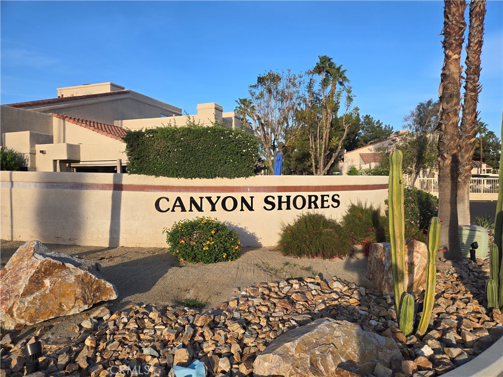 Fresh & Clean 1 Bedroom 1 Bath 1st floor condo in the Beautiful Canyon Shores gated community is now available for lease!!! This 1 bedroom Unit is perfect for a main home, vacation get away or 2nd home. Located next to one of the many pools and spas in the community. It features an extremely spacious living room with art lighting. The dining room is equipped with Plantation shutters and rich laminate flooring. The dining room opens to the kitchen with a breakfast bar. Speaking of the kitchen here you will find lots of cabinet and countertop space conveniently set up for the cook and Yes, the refrigerator is included. The main floor bathroom has been upgraded with granite counters and a custom tiled walk-in shower. The primary spacious bedroom has lots of closet space with mirror glass doors and an additional storage closet. The washer and dryer are located in the unit and are included. Only steps from one of the many pools and spas located throughout the community this is a real find. Canyon shores offers many walking paths, streams and water features to enjoy in this tranquil setting. There is a clubhouse, exercise room, saunas, 5 pools, 7 spas and several tennis courts as well as community activities for all to enjoy. Located close to shopping, entertainment and restaurants, it makes this a great spot to enjoy the best in the desert lifestyle.