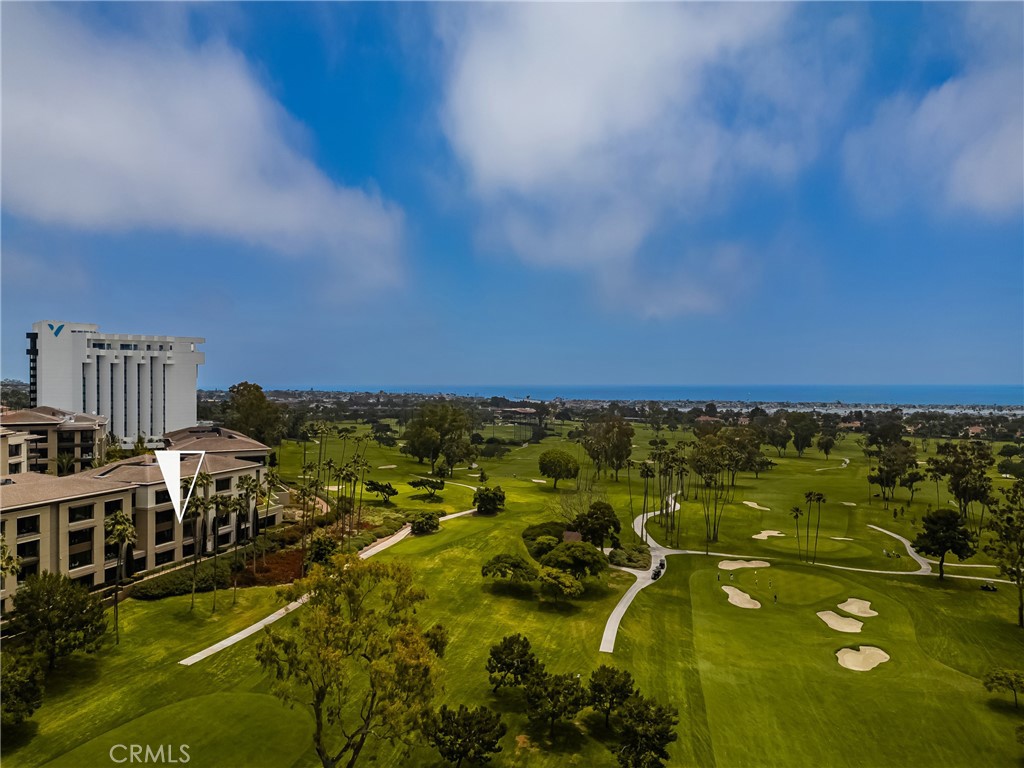 Welcome to this contemporary masterpiece, where luxury meets convenience in one of the most sought-after residences in Newport Beach. Ideally located, this home offers unrivaled access to the best the area has to offer. Expansive windows flood the interiors with natural light, highlighting an open floor plan designed for seamless living.
The professionally designed interiors boast premium upgrades such as Fleetwood sliding glass doors, a Lutron lighting system, and motorized shades that offer both beauty and functionality. Modern wood floors and panoramic views of the Pacific Ocean, Back Bay, and the prestigious Newport Beach Golf Course elevate the living experience to new heights.
For the home chef, the entertainers kitchen is nothing short of spectacular. An expansive island topped with luxurious stone counters is complemented by European-styled, frameless soft-touch cabinets. The kitchen is equipped with top-of-the-line Wolf and Sub-Zero appliances to deliver both style and performance.
The great room effortlessly blends elegant indoor spaces with the outdoor splendor, featuring a grand terrace perfect for entertaining guests while enjoying the stunning backdrop. The primary suite offers a serene retreat, complete with an ensuite spa-inspired bath designed for ultimate relaxation. The second suite features bright, welcoming spaces with city light views that create a sense of peace and privacy.
As the jewel of the Newport Center, The Meridian offers exclusive amenities, including an on-site concierge, a state-of-the-art fitness center, a yoga room, and both indoor and outdoor entertaining areas. Enjoy the expansive lap pool and spa, a motor court entry, secure parking, and coded access security throughout the building.
All of this, coupled with its proximity to world-class shopping at Fashion Island, renowned restaurants, and the vibrant beach cities, makes this home the epitome of luxury living at its finest.