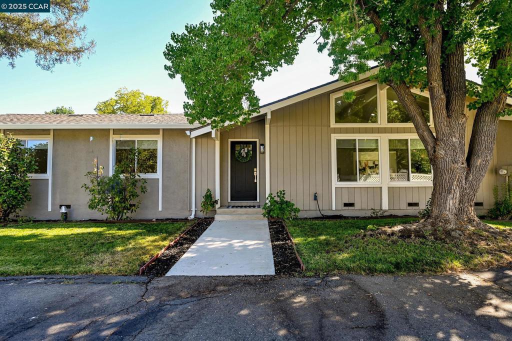 Located on a quiet private road near the Pleasant Hill/Walnut Creek border, this stylish 4 bedroom, 2 bath home offers comfort, convenience & modern upgrades. Adjacent to the desirable Poets Corner Neighborhood, enjoy access to top rated schools, new Pleasant Hill library, Larkey Park & Swim Club, Lindsay Wildlife Experience & favorite local hot spots; Rooted Coffee, Slow-Hand BBQ & Kobe Japan. Outdoor enthusiasts will love the ease to accessible Contra Costa Canal Trail. Close to vibrant downtown Pleasant Hill shopping dining & events. 1.5 mi to BART w/quick access to Hwy 24 and 680. The home has vaulted ceilings in living room, bright open floor plan & private primary w/huge walk in. A 2024 full remodel featuring stunning kitchen w/shaker cabinets, stainless appliances, decorative lighting, & stylish tile backsplash. Bathrooms are completely updated w/designer finishes. Additional details include solid core doors, recessed LED lighting, dual pane windows, insulation, roof, HVAC, electrical & fresh paint in/out. Spacious patio is ideal for entertaining w/extra parking for up to 4 cars beyond the 2 car garage. Backyard space & RV/Boat storage. Move in ready home blends privacy, thoughtful updates, & prime location offered at exceptional value.