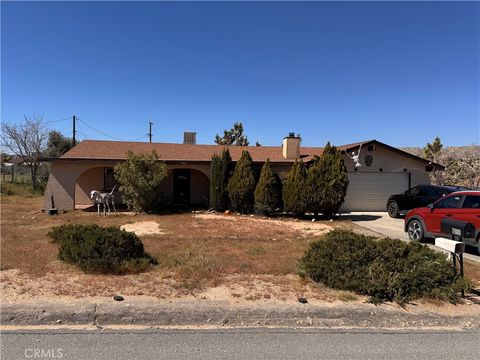 Photo of 7608 Bannock Trl, Yucca Valley, CA 92284 (MLS # IV26053666)