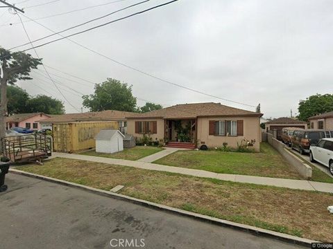 Photo of 212 W 103rd St, Los Angeles, CA 90003 (MLS # RS26044074)