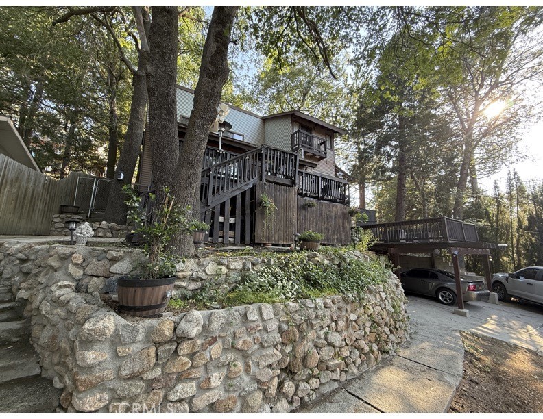 Tucked away in the peaceful pines of Crestline, this charming mountain home offers the perfect blend of comfort and adventure—just minutes from Lake Gregory! Enjoy easy access to the lake’s water obstacle course, kayaking, paddle boarding, fishing, skate park, paddle boats, canoes, cabanas, and scenic walking paths.
Inside, you’re welcomed by a spacious living room with soaring ceilings—ideal for relaxing after a day at the lake. The home features central forced heat and A/C, keeping you comfortable year-round. Step outside to enjoy multiple decks perfect for entertaining, grilling, or simply soaking in the tranquil surroundings beneath the mature oak trees.
Whether you're looking for a full-time residence, a weekend getaway, or a great short-term rental opportunity, this mountain gem is ready to impress.