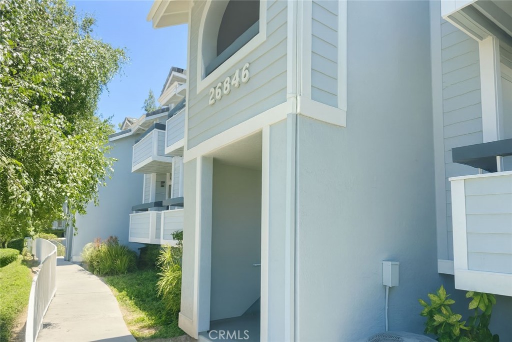A lovely and well established area within Santa Clarita, American Beauty Village is a great community with great amenities. Large end unit model with 3 bedrooms, 2 bathrooms. An open concept family room complete with fireplace and high vaulted ceilings, kitchen with updated granite counters, wood cabinetry. Indoor you will find the in-unit stackable laundry, Washer, Dryer are included. Large patio with room for BBQ and great views. The home has ceiling fans, many windows so it shows light and bright. The garage is attached at ground level just downstairs and has parking for 2 car tandem parking. Conveniently located steps to the pool. The community features gorgeous grounds great for an evening walk with your dog plus multiple pools and tennis courts. Don't miss this investment opportunity.
