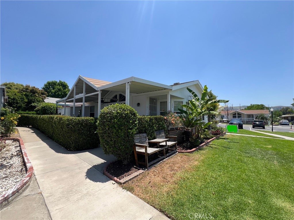 ONLY HOME WITH SOLAR IN THE PARK! Charming 3-bed, 2-bath dream starter home nestled beneath the hills of Yorba Linda and Anaheim. Located in the desirable Friendly Village community, enjoy one of the widest greenbelts right at your doorstep. This stylish home features bamboo flooring, cathedral ceilings, an open floor plan, and thoughtful upgrades throughout—including a 6.66kW solar system locked into NEM 2.0. The kitchen boasts stainless steel appliances, ample storage, and a large island. The spacious primary suite offers a walk-in closet, dual sinks, spa tub, and separate shower. Enjoy added privacy in the well-sized secondary bedrooms. A large patio, lush greenery, and extra storage complete the outdoor space. Tankless water heater Community amenities include a clubhouse, pool, gym, playground, and more—all within the top-rated Placentia-Linda School District and just minutes from parks, trails, and Disneyland.