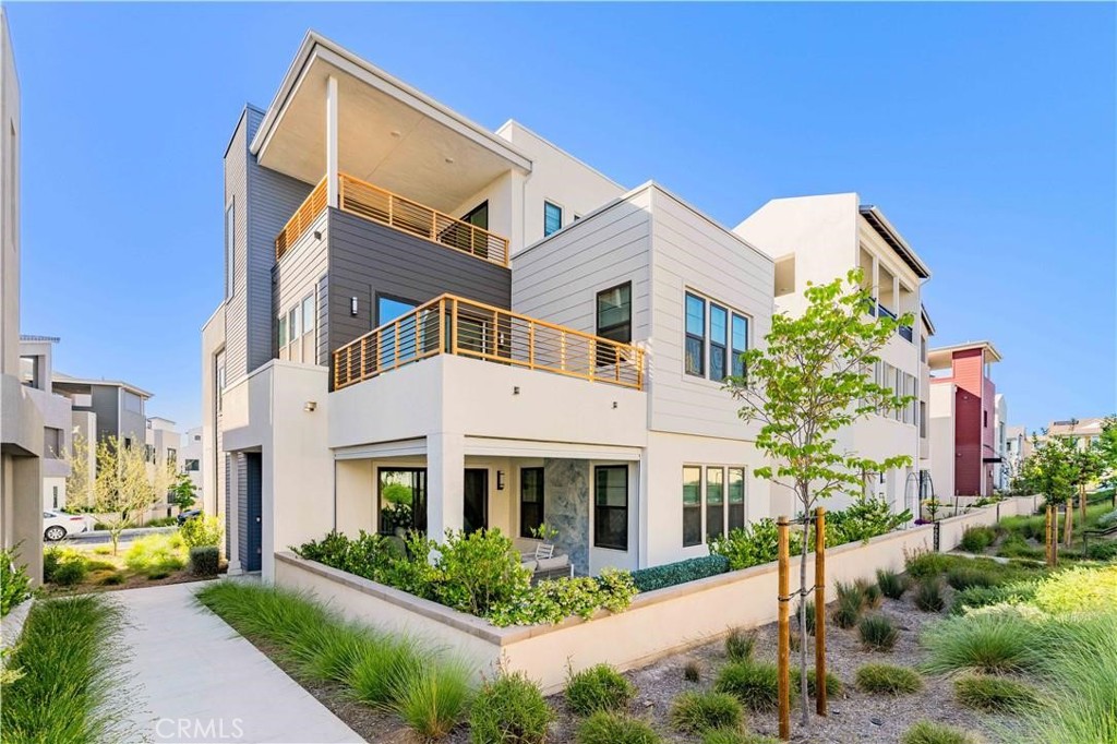 Welcome to this 4 bedrooms, 3.5 bathrooms, modern and comfortable house with luxurious yard and exquisite decoration in Irvine Unified School District. This house built in October, 2023 is located in the Solis Park of highly sought-after Irvine Great Park community, 5 minutes walk to the excellent K-8 Solis Park school, and 8 minutes walk to the newly built Irvine 10-point high school "Portola High School". The house has 4 bedrooms, 3.5 bathrooms, 3 balconies, and a spacious loft on the second floor with modern decoration. This is also the most popular plan in the community. This beautiful house has many upgrades, including flooring, curtains, lighting, clean filtered drinking water system, solar system, etc. In addition, there is a perfect Mini-Golf Court, exquisite modern landscape fish pond, colorful light waterfall. Live here and enjoy the charm of the resort-style community of Irvine Great Park. It is about 4 miles from Irvine Spectrum Shopping Center, about 12 miles to University of California, Irvine, Famous South Coast Plaza, and about 14 miles from Laguna Beach. Choose the resort-like community in the great park in Irvine. DON'T MISS IT! MUST SEE!