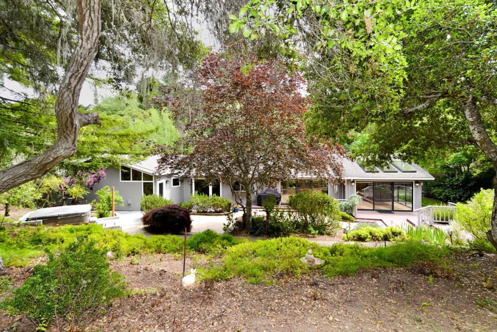 Large Single Level Family Home in Park Like Setting. Lots of sky lights and glass sliders that bring the light and outdoors in. Great for entertaining inside and out. New expanded entry and bedrooms.