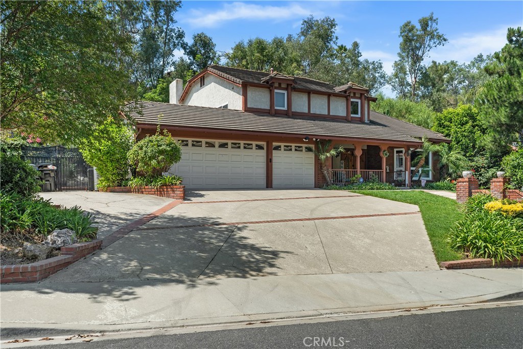 Welcome to 8 Rancho Laguna Dr., Pomona—a stunning 3,400 sq ft retreat in the prestigious Mission Hills Estates of Phillips Ranch. Nestled in the rolling hills, this meticulously upgraded home blends luxury and tranquility. Featuring natural wood flooring, energy-efficient double-pane windows, recessed lighting, a new AC unit and water heater, a grand double-door entry, and a spacious 3-car garage, this residence is designed for modern living.
The gourmet kitchen is a chef’s delight, boasting premium stainless steel appliances, sleek granite countertops, a large center island, commercial-grade fixtures, a built-in refrigerator, and a wine cooler. The inviting living room, with its cozy fireplace and wet bar, is perfect for entertaining.
The thoughtful layout includes a versatile main-level bedroom (or office), three upstairs bedrooms, and a charming beach-house-style bonus room for added functionality. Set on an expansive 18,000 sq ft lot, the private backyard oasis features a resort-style pool and spa with a striking rock waterfall, lush landscaping, a large shed, and a covered patio perfect for year-round barbecues and embracing California’s outdoor lifestyle.
The oversized master suite is a serene escape, with vaulted ceilings, a private fireplace, and a covered balcony overlooking the tranquil backyard and sparkling pool. Free of HOA or Mello-Roos fees, this move-in-ready gem offers seamless open-concept living, from the custom-cabinetry kitchen to the light-filled living areas with a grand fireplace, large windows, and an elegant dining space with a chandelier. Hardwood and tile flooring, paired with versatile living spaces, create an unmatched sanctuary of comfort and sophistication. Families will love the resort-like amenities and access to the schools in the Pomona Unified District (shared with North Diamond Bar), including Ranch Hills Elementary, Lorbeer Middle School, and Diamond Ranch High School.