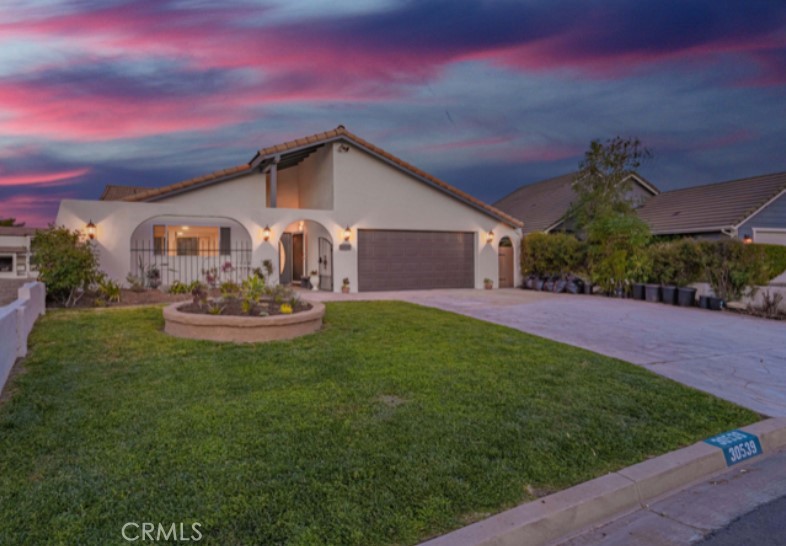 Waterfront Luxury in the Heart of Canyon Lake! Welcome to your own slice of paradise in the prestigious gated community of Canyon Lake! This stunning single-story waterfront home blends resort-style living with everyday comfort, offering breathtaking panoramic views of sparkling waters and the surrounding natural beauty—right from your private balcony. Home Highlights:3 spacious bedrooms & 3 full bathrooms with approximately 2,400 sq. ft. of thoughtfully designed living space. Gourmet kitchen with included refrigerator and open flow for entertaining. Newly remodeled master shower for a spa-like retreat. Epoxied 2-car garage plus a lower-level maker’s space featuring a workshop, storage area, and a large bonus room—perfect for hobbies, fitness, or a home office. Private covered boat dock with hydro lift for effortless lake access, ideal for boating, fishing, paddle boarding, or tranquil sunset cruises right from your backyard patio. Community Perks: Living in Canyon Lake means more than just a beautiful home—it’s a lifestyle. Residents enjoy: Private beaches & scenic parks. Championship golf course, Tennis, basketball, and sand volleyball courts, Year-round community events and recreational activities. Whether you’re a boating enthusiast, an entertainer at heart, or simply seeking a peaceful waterfront retreat, this home offers the perfect blend of luxury, privacy, and recreation.