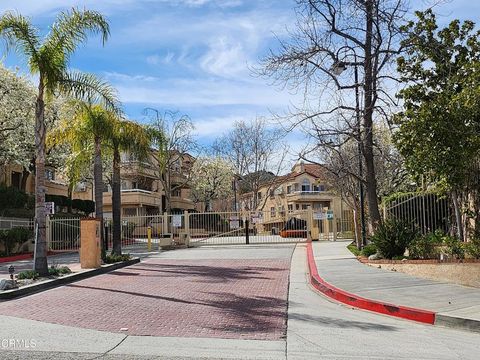 Photo of 19847 Sandpiper Place #137, Newhall, CA 91321 (MLS # P1-25408)