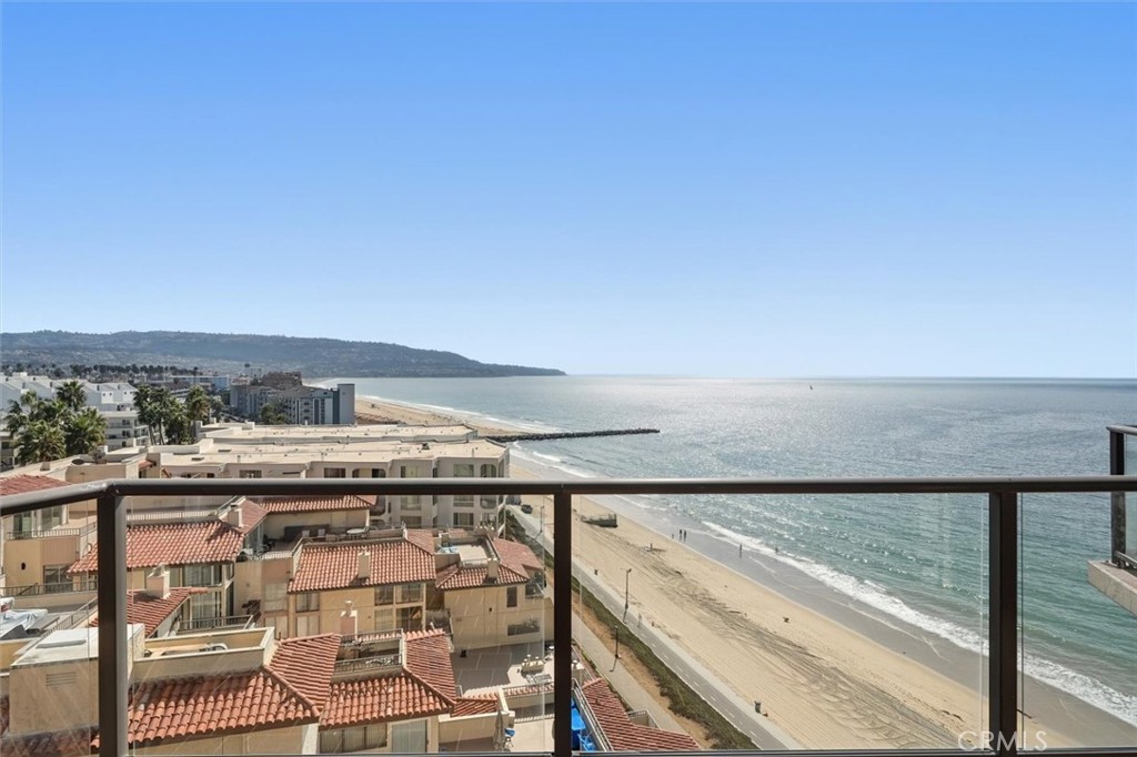Live the ultimate coastal lifestyle in Redondo Beach at Ocean Plaza, where resort-style amenities and unbeatable beach access set the stage for everyday luxury. From the garage, step directly onto the beach and bike path—just moments from the Redondo Pier, Veterans Park, and the sandy shoreline. You’re also just a short drive from Hermosa Beach, Manhattan Beach, and Riviera Village’s vibrant shops, cafés, and fine dining.
Ocean Plaza offers a full suite of amenities including a sparkling pool, spa, ocean-view sun deck, fitness center, and clubhouse. Outdoor living continues at home with a generous front patio—perfect for entertaining or dining al fresco—and private balconies off both bedrooms to soak in fresh ocean breezes and colorful sunsets.
Inside, this beautifully updated southwest-facing 2-bedroom, 2.5-bath condo combines comfort and style. Enjoy sweeping ocean views from the open-concept living and dining area, and wood flooring. The sleek galley kitchen features quartz countertops, ample cabinetry, stainless steel appliances.
Upstairs, both bedrooms boast stunning ocean views and direct balcony access. The spacious primary suite includes a large walk-in closet and an elegant ensuite bath, while the second bedroom offers its own private bathroom.
A tandem garage provides secure parking and extra storage, rounding out the convenience of this exceptional home.