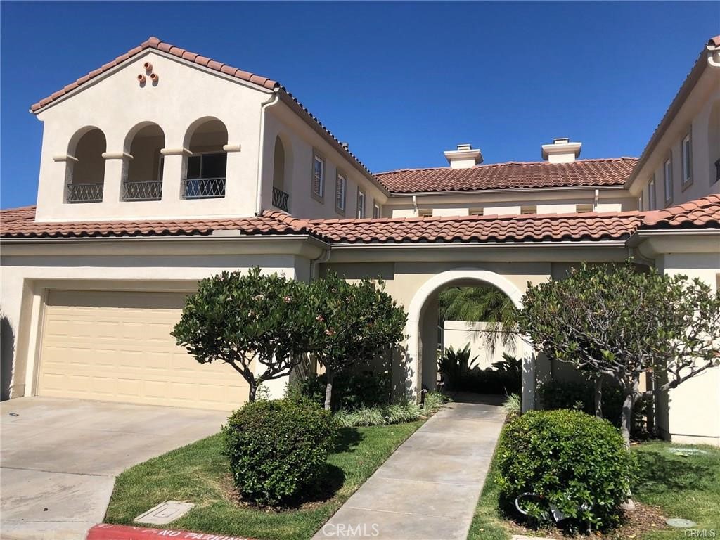 Three bedroom townhome overlooking the second fairway of the coveted Talega golf course. Downstairs bedroom/den. Dual generous sized primary suites upstairs each with their own private deck. Living room with cathedral ceiling. Gourmet kitchen with granite counters and breakfast nook with golf course views. Family room also offering fireplace and golf course views. Serense golf course views from the private back patio. Two car attached garage. Nearby community pool and spa. Enjoy all the amenities the Talega lifestyle has to offer.