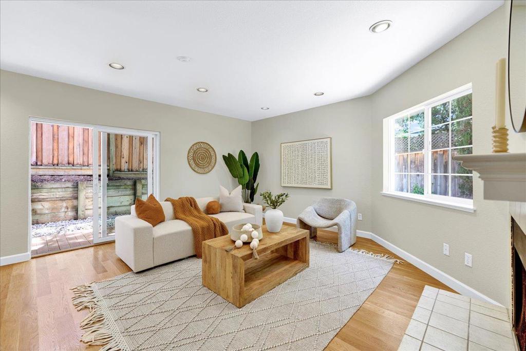 Nestled in Saratoga's highly desirable Golden Triangle neighborhood, this charming 3bd/2.5bth home is where location, comfort and top schools come together! Stepping inside, you'll be greeted by soaring high ceilings, elegant travertine tile, rich hardwood floors, recessed lighting, fresh paint, and a remodeled kitchen with premium Omega cabinetry alongside a separate pantry. Each bedroom features its own vaulted ceiling and private balcony, creating an airy, light-filled retreat for every member of the household. While the spacious primary suite includes a 2nd fireplace, ample closet space, and a spa-like bath with soaking tub, separate shower, and skylight, the additional two bedrooms share a fully remodeled Jack-and-Jill bathroom -- ideal for comfort and convenience. Everyday ease is enhanced with a dedicated laundry room, 220V outlet in garage for EV charging, updated furnace and tankless water heater, while the park-like decked yard is perfect for outdoor entertaining or quiet relaxation. With a prime location close to top schools, major tech campuses, shopping, dining, and commuter routes, this home offers the ultimate combination of lifestyle and location.