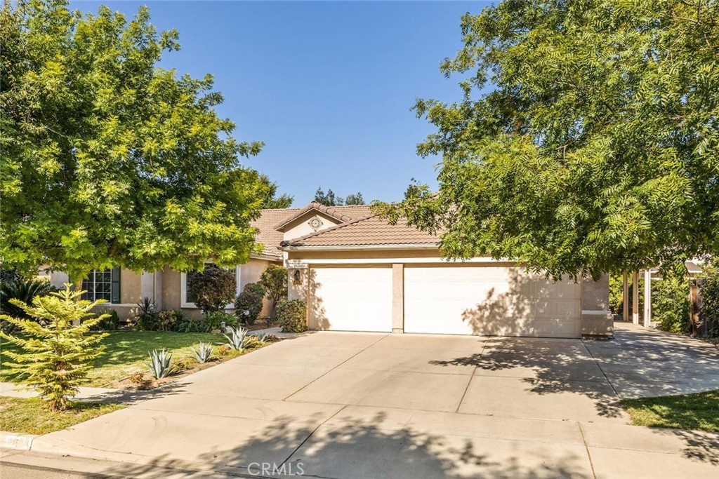 FULLY FURNISHED HOME in the highly desirable Shannon Ranch neighborhood, this stunning 4-bedroom, 2.5-bath home offers 2,573 sq. ft. of sprawling living and true pride of ownership! From the moment you arrive, the curb appeal and grand entrance sets the tone. Inside, you'll find a bright and open concept layout featuring a formal living and dining with an abundance of glass, flooding the space with natural light. A cozy family room with a fireplace and additional backyard access—perfect for entertaining. The kitchen is a chef's dream with ample cabinetry, a center island, stainless steel appliances, and an oversized pantry. Enjoy the convenience of indoor laundry and a desirable floor plan, offering privacy between the bedrooms. All bedrooms are generously sized, including the impressive primary suite with double-door entry, private patio access, a stylish wood panel accent wall, vaulted ceiling, walk-in closet, and a spa-like bath with soaking tub, separate shower, custom built dual vanities, and abundant storage. Step outside to your own serene retreat with a low-maintenance backyard, koi pond with waterfall, large, covered patio with built in misters, and a variety of fruit trees. Complete with a 3-car garage and potential RV parking, this home truly has it all!