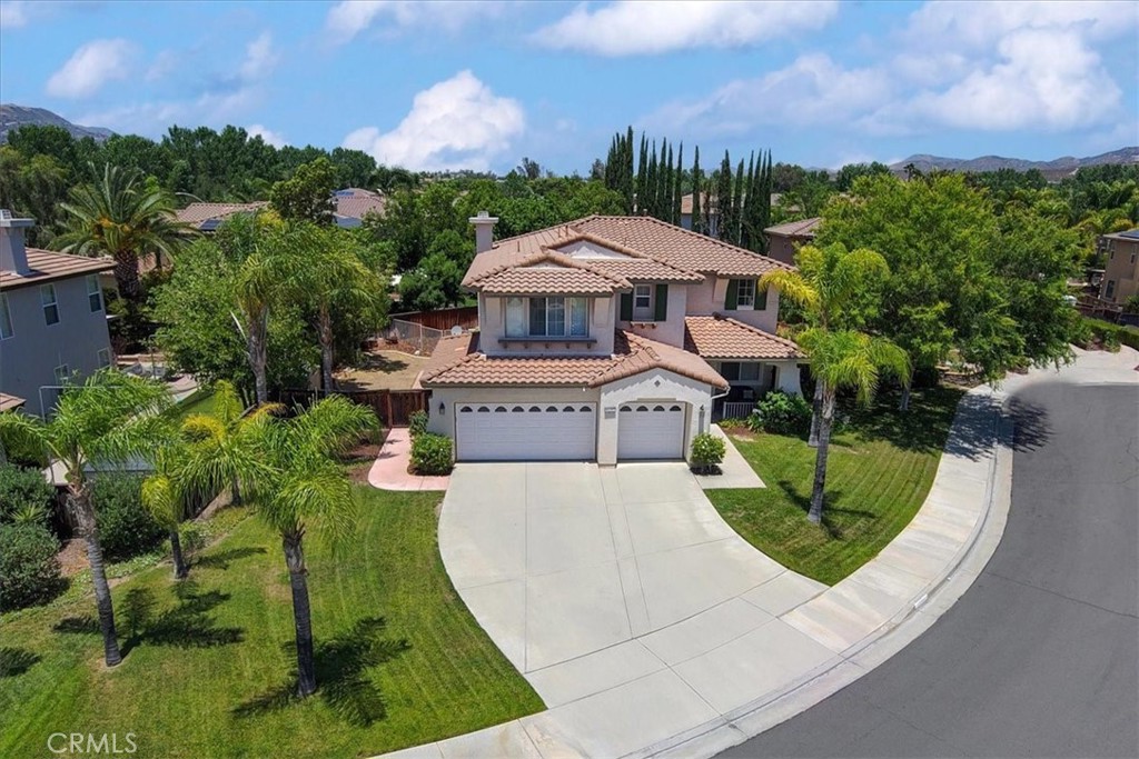 Welcome to your perfect family home located in a highly desirable neighborhood on the west side of Murrieta with low taxes, no HOA, and great schools. This 4-bedroom home with an additional office and 2.5 bathrooms offers the perfect blend of comfort, style, and space. Located on a large 0.25+ ACRE LOT, the possibilities are endless - add RV parking, build an ADU, or install a batting cage in the expansive, usable yard. The cul-de-sac offers minimal through traffic, enhancing safety for pets and kids to play outside. Inside, enjoy granite countertops, newer kitchen appliances, and TWO NEW A/C units to keep you cool all summer long. The spacious primary suite features a barn door, walk-in closet, and a dual vanity. All bedrooms have ceiling fans to help with those warm summer days and nights. Step into your private backyard paradise complete with a PEBBLE TEC pool and spa, ideal for relaxing or entertaining. Whether you’re looking for room to grow, space to entertain, or just a peaceful place to call home, this one checks all the boxes.