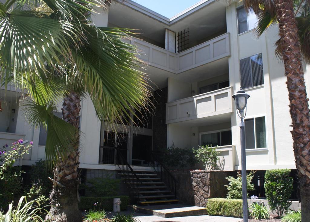 Wonderful Palm Gardens condo -- spacious one bedroom, one bath unit is light & bright, with newer floors, fresh paint, super clean kitchen, newer fridge. Comfortable living room with eat in kitchen; amenities include: security building, pool, laundry on same floor, underground gated parking and storage. No pets or smokers please. Convenient location to shopping and freeways.