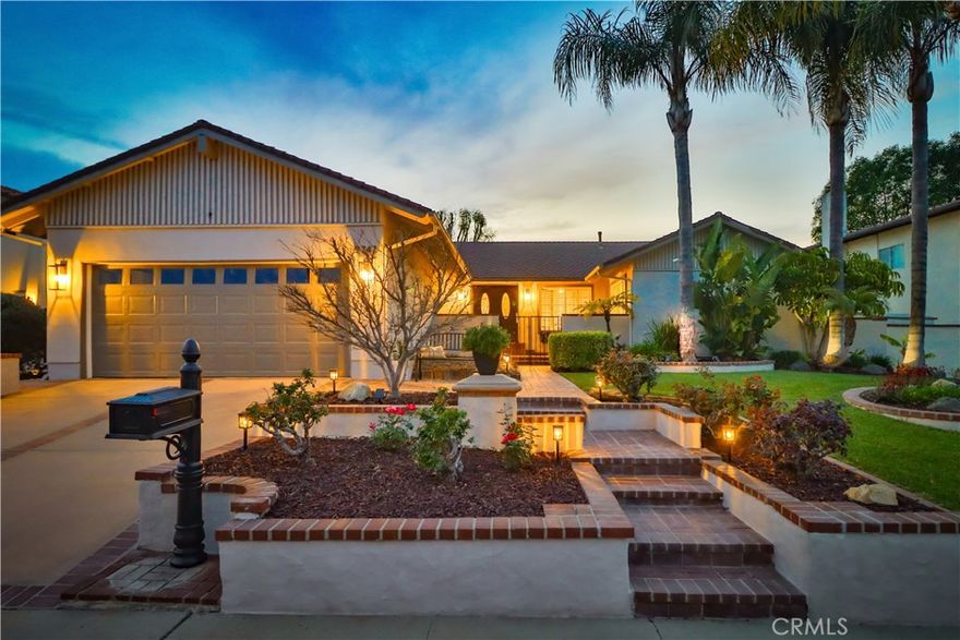 Charming Single-Story Stunner in Highly Desirable Wildwood Neighborhood. Discover this beautifully updated 4-bedroom, 2-bathroom home nestled in the coveted Wildwood neighborhood. Situated on a peaceful cul-de-sac, this single-story gem offers a perfect blend of modern upgrades and timeless charm. From the moment you arrive, you'll be captivated by the mature landscaping, brick hardscape walkways, and fresh exterior paint. Inside, the home is filled with natural light, plantation shutters, recessed lighting, and stylish new fixtures, including ceiling fans in each room. The inviting formal living room boasts vaulted ceilings, a cozy brick gas fireplace, and built-in bookcases, creating an ideal space for entertaining or unwinding. The open-concept layout flows into the dining area and kitchen, where you'll find granite countertops, stainless steel appliances, solid wood cabinets, and a bay window with partial Wildwood Mesa views. A large walk-in pantry adds extra storage and convenience. The primary suite is a peaceful retreat with a walk-in shower and serene atmosphere. The additional bedrooms and updated bathroom feature freshly painted vanity and elegant crown molding. Step outside to the tropical entertainer’s backyard, featuring a newly painted deck with a built-in jacuzzi, a fully serviced pool, and a tranquil Zen fountain and waterfall. Several outdoor seating areas provide the perfect setting for relaxation or hosting gatherings. This home also includes solar panels for energy efficiency, built-in storage cabinets in the garage, and a spacious 2-car garage with ample parking. Ideally located just a short walk to tennis and basketball courts, soccer fields, and scenic hiking trails in Wildwood Park, with Wildwood Elementary School nearby, this home offers an exceptional lifestyle. Don't miss this rare opportunity to own a meticulously maintained home in one of Thousand Oaks' most sought-after neighborhoods!