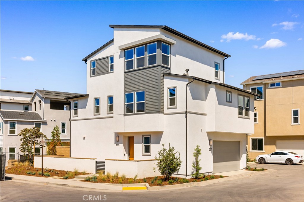 Welcome to this stunning brand-new 2025 built detached home located in the highly desirable Great Park – Luna Park community of Irvine. Situated on a corner lot, this home offers a perfect blend of modern design, functional living, and convenience within the award-winning Irvine Unified School District.
Property is 2,429 Sq.Ft. | 3 Stories,4 Bedrooms | 3.5 Bathrooms,Attached 2-Car Garage with Direct Access.Additional Features: Loft, Private Deck, Front Patio, and Backyard.
The first floor welcomes you with a gourmet kitchen featuring modern appliances, easy-to-use cabinet drawers, and a spacious pantry. A convenient half bathroom is nearby, along with the bright and open living room that connects seamlessly to a private backyard perfect for entertaining and outdoor living.On the second level, you’ll find three bedrooms, a laundry room, and the luxurious primary suite, while the third floor features the fourth bedroom, a versatile loft, and a spacious balcony with abundant natural light.
Interior finishes include carpeted bedrooms for comfort and tile flooring in the living areas, kitchen, and bathrooms for easy care.
Community & Location:Located in Luna Park at Great Park
Walking distance to Portola High School and Solis Park K-8
Close to community pool, clubhouse, and playgrounds
Convenient access to shopping, dining, and entertainment .Nearby Canopy at Great Park where envisioned as a 12-acre, all-day destination featuring over 80,000 to 90,000 square feet of retail, dining, and essential daily services. This vibrant plaza is scheduled to open in 2026.