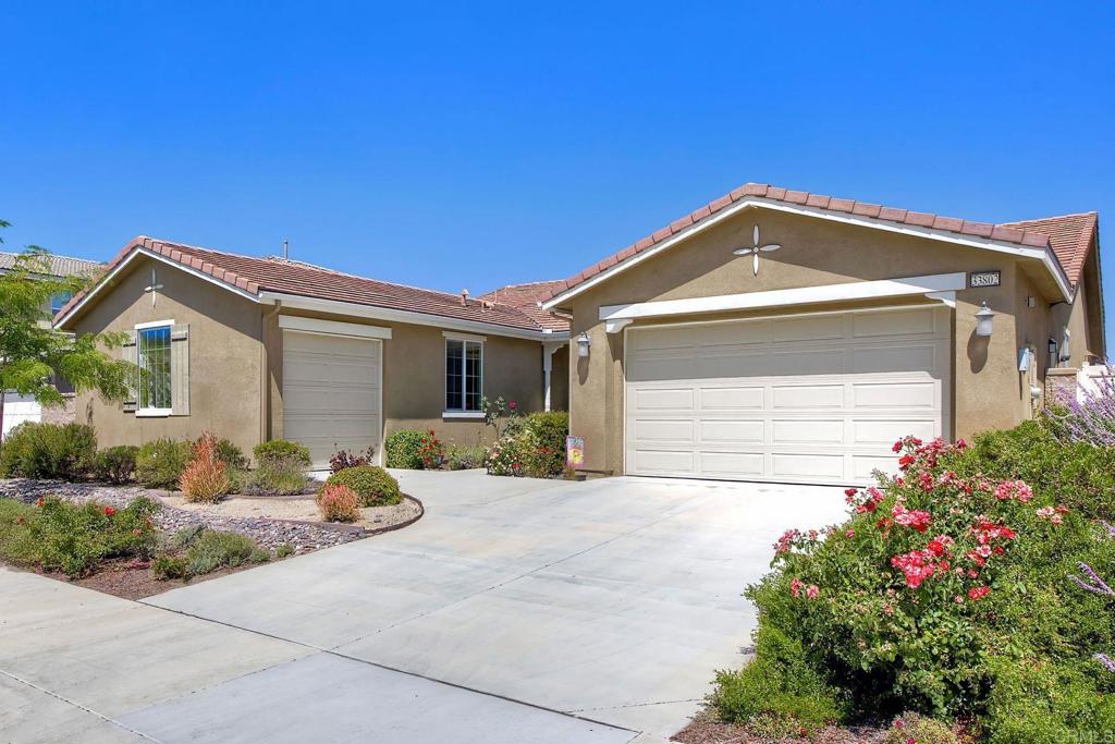 Searching for the perfect single-story home with a great floor plan - look no further. Open concept kitchen/dining and great room, flooded with natural light. Generous sized Primary Ensuite with large walk-in closet and door to patio to enjoy views. 2nd bedroom down the hall, another full bathroom, a dedicated office space and a teen/game room. 3rd bedroom with ensuite on opposite side of the house, perfect for in-law suite or guest room. Ceiling fans throughout as well as whole house fan. Head out to the backyard the views are amazing while you sit under the covered patio. Around the side of the home, raised garden beds, fruit trees, low maintenance yard. Solar is leased.