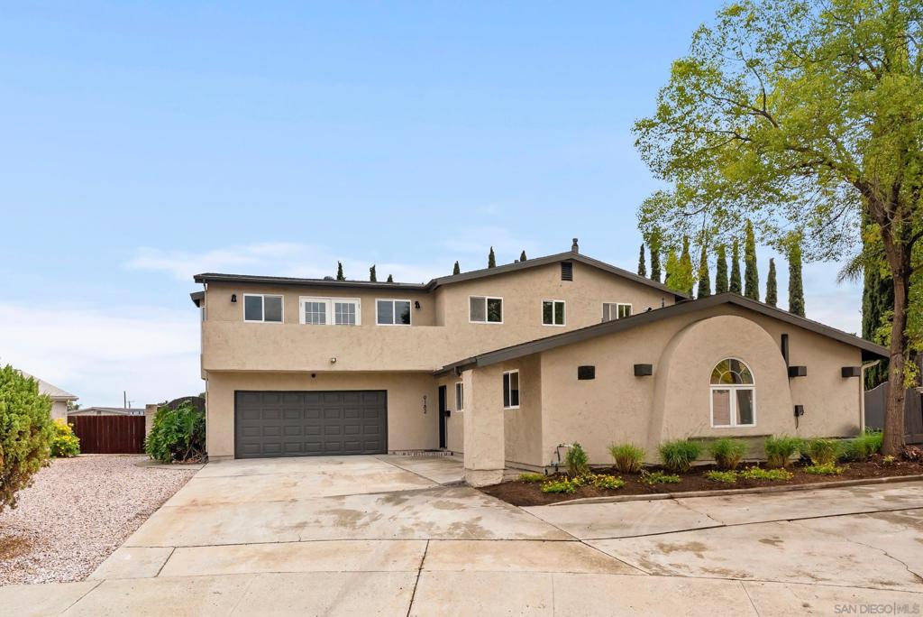 Renovated Santee Home with Mountain Views, Large Sunroom, Loft Space, and RV Parking! Tucked away at the end of a peaceful cul-de-sac, this beautifully updated home blends modern upgrades with flexible living spaces—ideal for today’s lifestyle. The open-concept layout is filled with natural light and features a fully renovated kitchen with custom cabinetry, upgraded appliances, and stylish finishes. A spacious sunroom offers the perfect bonus area for relaxing, entertaining, or working from home. Upstairs, the expansive primary suite spans the entire level and includes a spa-inspired en-suite bathroom, oversized walk-in closet, and a generous loft space that can easily be converted into a fourth bedroom, office, gym, or retreat. Downstairs, additional bedrooms provide comfortable accommodations for family or guests. The professionally landscaped backyard offers multiple outdoor seating areas, mature trees for privacy, and room to entertain or unwind. Additional highlights include ample parking space with dedicated RV/boat parking, a serene setting with panoramic mountain views, and a location close to local parks, schools, and shopping. This move-in-ready home combines comfort, versatility, and privacy in one of Santee’s most sought-after neighborhoods.