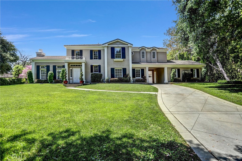 Modern Elegance in Santa Anita Oaks. A bright and sophisticated contemporary estate located in the prestigious Santa Anita Oaks neighborhood of Arcadia. Privately set behind gates on a generous 0.8-acre lot, this impressive 2006-built residence boasts 5,630 square feet of open-concept living space, offering 6 bedrooms and 7 bathrooms 6-car garage. The interior showcases soaring ceilings, expansive windows, and a bright and airy flowing floor plan that seamlessly connects the formal living and dining areas to a sleek, chef-inspired kitchen. Perfect for extended stays or multi-generational living, the main floor features a private guest suite with its own living area. Upstairs, the luxurious primary suite provides a serene retreat, complemented by spacious secondary bedrooms. Designed for both comfort and entertaining, the backyard offers resort-style amenities including a sparkling pool and spa, beautifully manicured landscaping, and generous parking with 6-car garages plus space for an RV or boat. Ideally located near award-winning schools and convenient local amenities, such as the shining and reflected blue pond with its own filer, seen from the living room, formal dining room and family, and a complete bocci ball court. this modern estate delivers the perfect blend of privacy, elegance, and lifestyle.