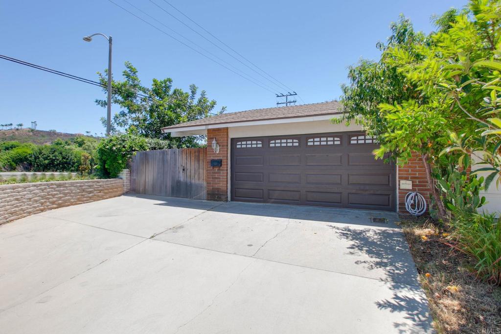 Amazing opportunity in desirable San Marcos! Home features include a spacious corner lot 2 bed / 2 bath in GREAT condition. It really feels like a traditional detached home! Only shares one common wall. Fully fenced, newer ceramic tile throughout and fireplace in living room. The primary bedroom has a walk in closet. Ceiling fans, remodeled bathrooms, dual pane windows and patio door. The private backyard has a variety of fruit trees. 2 car attached garage. Centrally located with easy freeway access, walking distance to community center and UC San Marcos. No HOA fees or Mello Roos.