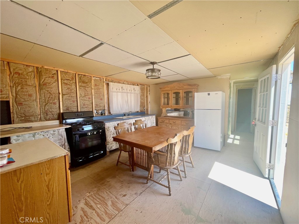 Water, power 5 acres and a manufactured home that offers incredible potential for the right buyer with a vision. While it may need some work and a bit of TLC to bring it to its full potential, it’s a true diamond in the rough. The home has never been fully completed, leaving ample opportunity to make it your own. Situated in a fantastic location with breathtaking views, this property provides a peaceful sanctuary and a unique opportunity to create your ideal living space.
This property offers an opportunity to own a home with views and acreage at an attractive price point.
Located near Giant Rock Meeting room for pizza and entertainment, La Copine Restaurant, Gubler Orchids which is known as one of the top quality growers in the world, The Integratron, Joshua Tree National Park, the area promises both tranquility and adventure. Abundant hiking and off-road trails further enrich the location.
See private remarks and thank you for showing.