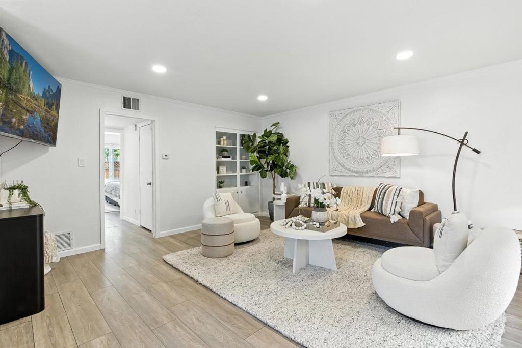 Welcome to this light-filled, beautifully updated 2-bedroom, 2-bathroom condo located in the sought-after Fountaine West community. This inviting ground-floor end-unit offers the perfect blend of comfort and convenience, with a spacious open floor plan ideal for entertaining family and friends. The modern kitchen features quartz countertops, a gas range, and generous cabinet space. Two good-sized bedrooms include a primary suite, providing a relaxing retreat with access to a back patio. Enjoy the outdoors year-round on the large, enclosed private front patioperfect for al fresco dining or simply unwinding in your own quiet space. Ample storage is provided by the large stand-alone shed on the patio, interior closets, and extra space in the carport. Ideally situated near Highways 101, 92, and 280, as well as public transportation, this home offers easy access to the entire Bay Area. Youll also love being just a short walk to Marina Plaza Shopping Center and minutes from Hillsdale Mall, dining, and more. Approximately 950 sq. ft. Dont miss this move-in ready gem in a prime location!