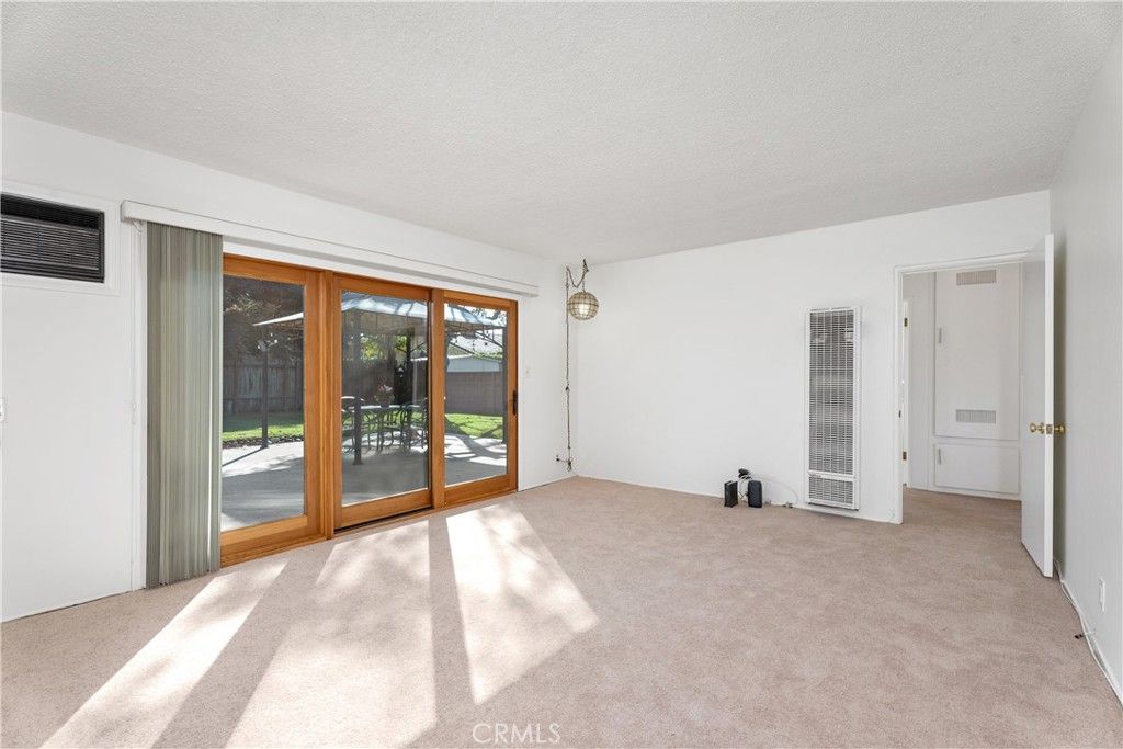 Photo of 9542 Chanticleer Rd, Anaheim, CA 92804 (MLS # OC25256448)