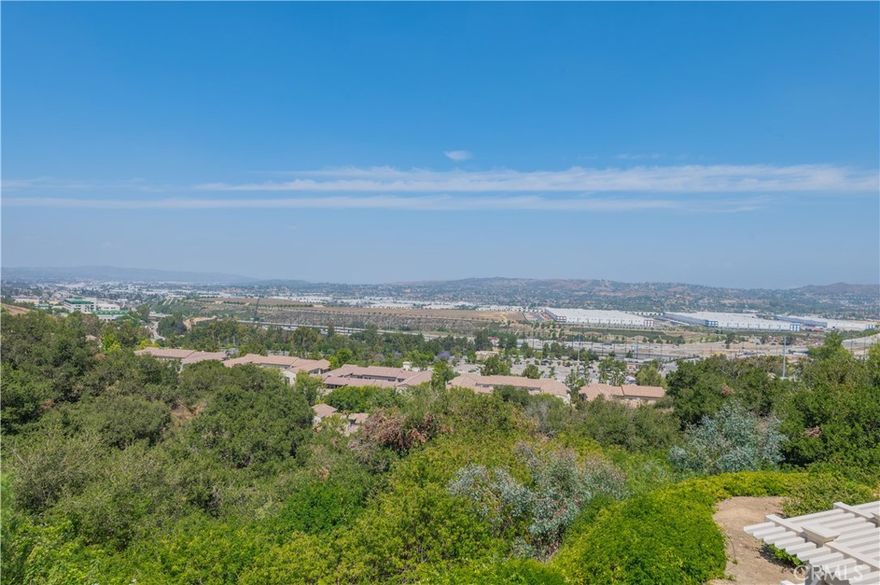 Exceptional view residence in the prestigious Montefino community of South Diamond Bar. This elegant home features two ensuite bedrooms and an open, light-filled floor plan. The inviting living room offers tile flooring, a brick fireplace and seamless indoor-outdoor flow to a private patio with peaceful hillside —perfect for relaxing or hosting gatherings. The upgraded gourmet kitchen showcases granite countertops, custom cabinetry and stainless steel appliances, and opens to a cozy den/family room. The spacious primary suite offers a retreat area with a fireplace, walk-in closet and a private balcony with panoramic views. Its upgraded en-suite bathroom includes a separate tiled shower and an oversized tub accented with glass tile. The secondary bedroom suite features a dual-door closet and its own upgraded bathroom with a tiled shower, quality vanity and a new mirror. This property has a two-car garage and is located in one of the best spots in the community with easy guest parking close by. The HOA provides 24-hour security patrol, covers water and trash, and grants access to community amenities including pools and a spa. *Convenient access to major freeways *Award-winning Walnut Valley Unified School District *Short walk from shopping, dining, and the post office. **The furniture is for staging purposes only to help illustrate the potential layout and use of the space.

This home offers the perfect balance of convenience, comfort, and community. Don’t miss your chance to own this gem—it won’t last long!