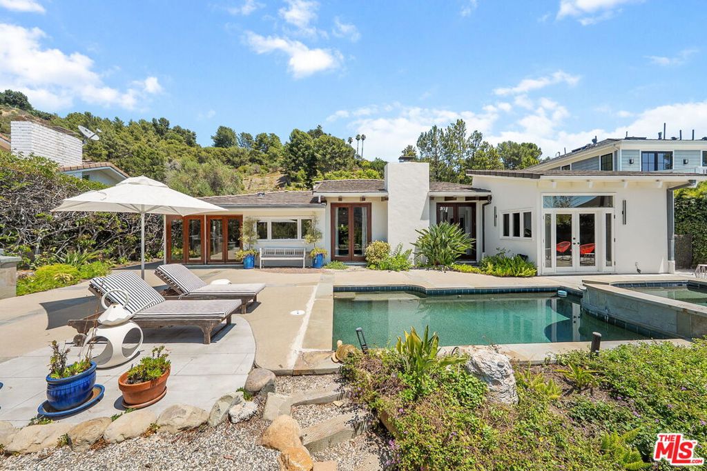 Breathtaking views from this one story private retreat located in the hills of Brentwood. Beautifully updated 3 bedroom, 2.5 bath home includes high beam ceilings, open floor plan and spectacular mountain views from almost every room! Kitchen offers stainless appliances, Caesarstone countertops and family/breakfast room. Fabulous main bedroom includes large en suite bathroom & dual closets. Open dining and living room inclusive of a cozy fireplace and French doors that lead to backyard. Serene landscaped yard includes dramatic salt water pool & spa, built in BBQ, outdoor dining area, and plenty of spots to lounge and enjoy the majestic views. Great for families & entertaining. Freshly painted and ready for move-in starting mid October.