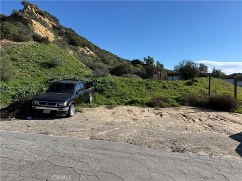 Photo of 0 Lot 009 Eveningside Drive, Val Verde, CA 91384 (MLS # SR26005531)