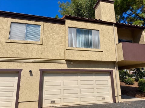 Photo of 9385 Mesa Verde DR #E, Montclair, CA 91763 (MLS # CV26200864)
