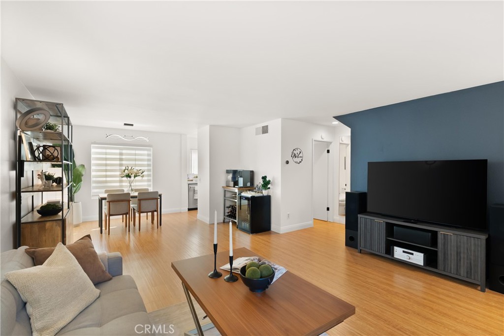 Imagine living in this elegantly renovated, turn-key 2-bedroom, 2.5-bath Townhome in the highly sought-after gated Summerwind community - perfectly situated in the heart of Torrance.
Positioned in one of the most desirable locations within the complex, this home enjoys tranquil views of a beautiful stream and pond surrounded by mature trees, offering exceptional privacy and a peaceful ambiance with no street noise.
Step inside to an airy, light-filled layout featuring brand-new luxury flooring, fresh interior paint throughout, upgraded dual-pane windows including the sliding glass door, designer lighting, and tastefully updated kitchen and bathrooms. The first floor offers a spacious living room that opens to a private patio - perfect for morning coffee or relaxing by the soothing stream - a stylish kitchen with quartz countertops, luxury stainless steel appliances with premium upgrades such as air fry mode, LED light-up dials, and a three-rack dishwasher. The kitchen also features an upgraded exterior exhaust vent. The same floor offers a convenient bathroom for guests - enhanced with a TOTO toilet/seat.
Upstairs, both bedrooms are thoughtfully located on the second floor, each with its own en-suite bathroom for comfort and privacy. The primary suite features a beautifully upgraded walk-in shower with a dual-slide hanging glass door.
The attached two-car garage provides direct access and ample storage, while a spacious separate laundry room with upgraded cabinetry and a sink adds everyday convenience. There’s also an additional oversized storage room off the garage - an outstanding feature for extra space. A new tankless water heater, central AC and heat with a Nest thermostat - all add to the home’s comfort and efficiency.
Summerwind residents enjoy resort-style amenities including 3 sparkling pools, 3 relaxing spas, a clubhouse, tot lot, beautiful ponds and waterfalls, and generous guest parking. Another desirable feature of this community is the back gate that leads to Hickory Elementary School - just steps away and incredibly convenient for drop-offs and pick-ups.
The location is unbeatable: only one block from Wilson Park and its weekly farmers markets, minutes from Madrona Marsh, Del Amo Fashion Center, favorite South Bay beaches, top-rated Torrance schools, LAX, amazing restaurants, and premier shopping.
This is the heart of South Bay living - where comfort and lifestyle come together beautifully in ONE EXCEPTIONAL HOME.