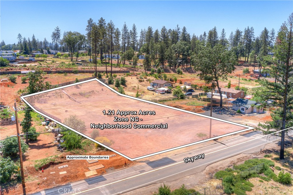Unique 1.2-acre parcel with two addresses (8566 & 8570 Skyway) zoned Neighborhood Commercial (NC). Previously improved with a commercial building and detached residence, offering the benefit of an active PID water connection and existing septic system (condition unknown). Excellent opportunity with versatile potential for redevelopment in a prime location along the Skyway.