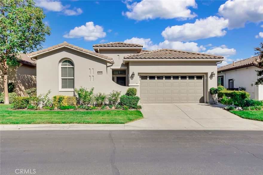 "MILLION-DOLLAR VIEWS WITHOUT THE MILLION DOLLAR PRICE TAG!" Welcome to this beautifully upgraded SINGLE story home (Tenaja Model) in the coveted Trilogy @ Glen Ivy.  Glen Ivy is the Inland Empire’s premier 55+ active adult community, nestled at the base of the Cleveland National Forest and surrounded by the stunning Glen Ivy Golf Course. This home offers resort-style living with breathtaking panoramic mountain views and twinkling night city lights. Step inside to a bright, open-concept layout that radiates elegance and comfort. The heart of the home features a remodeled floor-to-ceiling fireplace, crown molding throughout, and fresh paint inside and out. The expansive gourmet kitchen is a chef’s delight with oversized wrapping island, newer 42” cabinets, stainless steel appliances, and modern lighting. Additional luxury touches include: Whole house fan for energy efficiency, Artfully designed ceiling fans, windows are adorned with Plantation shutters for classic charm and sunshades for keeping cool, Beautiful 18” angled tile & engineered wood flooring, Updated modern hardware and finishes, Stylish remodeled bathroom, Versatile “Hollywood” themed sitting room, Built-in Murphy bed in Bedroom #2 (included!). Step outside and be amazed ... the entertainer’s backyard boasts a 3-hole putting green, tranquil waterfall pond, five mature fruit and citrus trees, night-time ambient garden lighting, and a brand new heated above-ground spa (yes, it's included!). This outdoor oasis is perfect for enjoying your morning coffee or hosting sunset gatherings while soaking in those incredible views. As a resident of Trilogy @ Glen Ivy, you’ll enjoy access to world-class amenities including: The Lodge and Ballroom, The Blue Water Sports Club with indoor/outdoor pools, a state-of-the-art fitness center, and an exciting calendar of social activities. HOA-managed front yard landscaping for low-maintenance living. Don’t miss this rare opportunity to own luxury, location, and lifestyle ... all at an unbeatable value. Your forever home awaits! Home is priced to sell…
